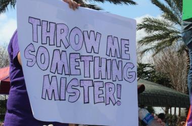 Mardi Gras Parade scene sign Throw Me Something Mister (DC)